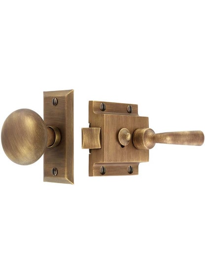 Early 20th Century Reproduction Screen Door Latch Set in Antique Brass.
